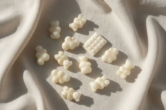LJ Candle Co Cocoa Butter Cashmere Wax Melts in a decorative dish, showcasing creamy, smooth wax pieces for a luxurious fragrance.