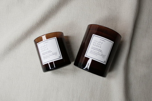Heart Armor candle by LJ Candle Co with a heart-shaped design and warm, inviting glow.