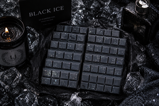 LJ Candle Co Divine Masculinity wax melts in a clear plastic container with a black label and a silver lid, set against a neutral background.